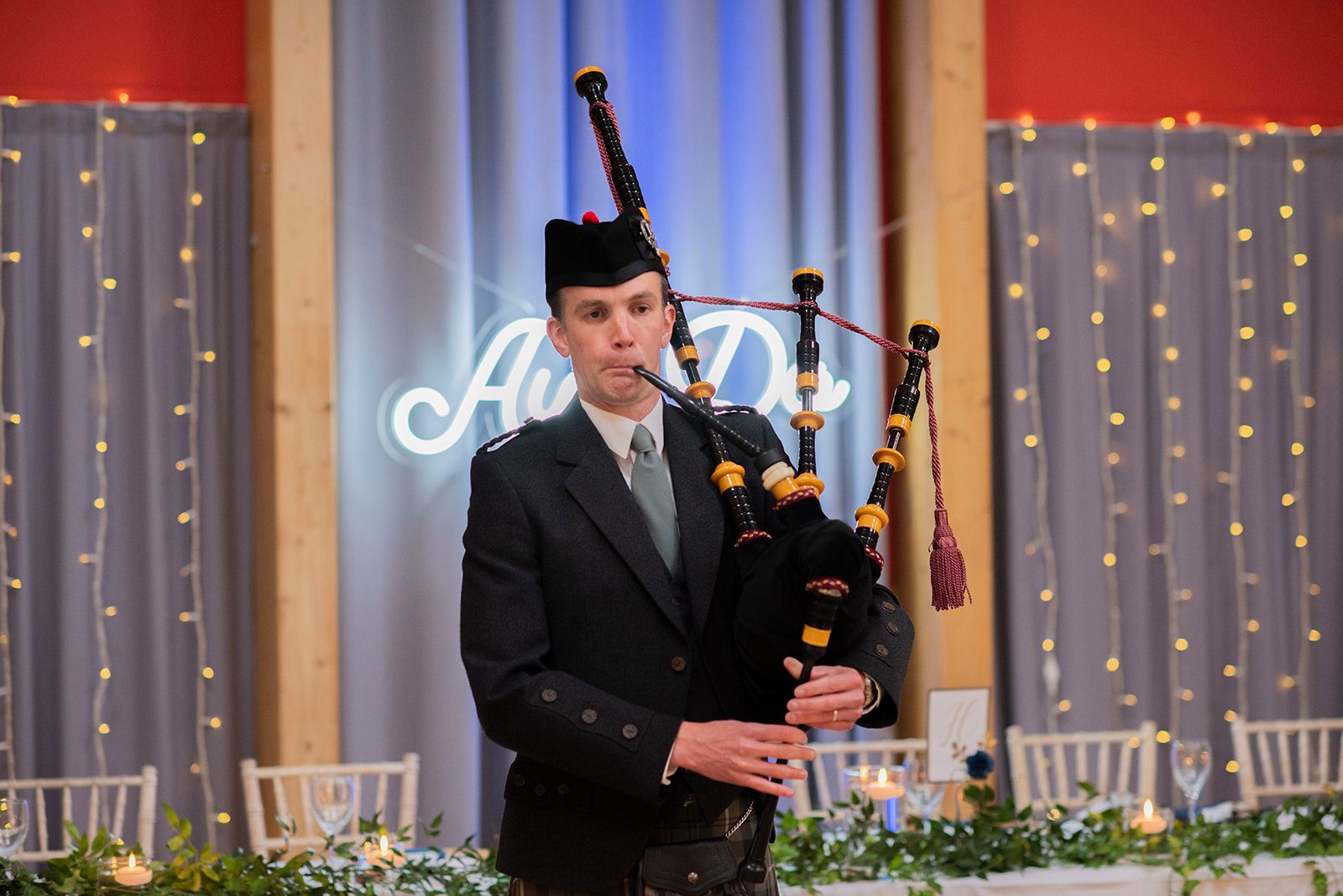 Alistair Brown - Ayrshire Bagpiper playing the pipes in Arrochar at styled Wedding
